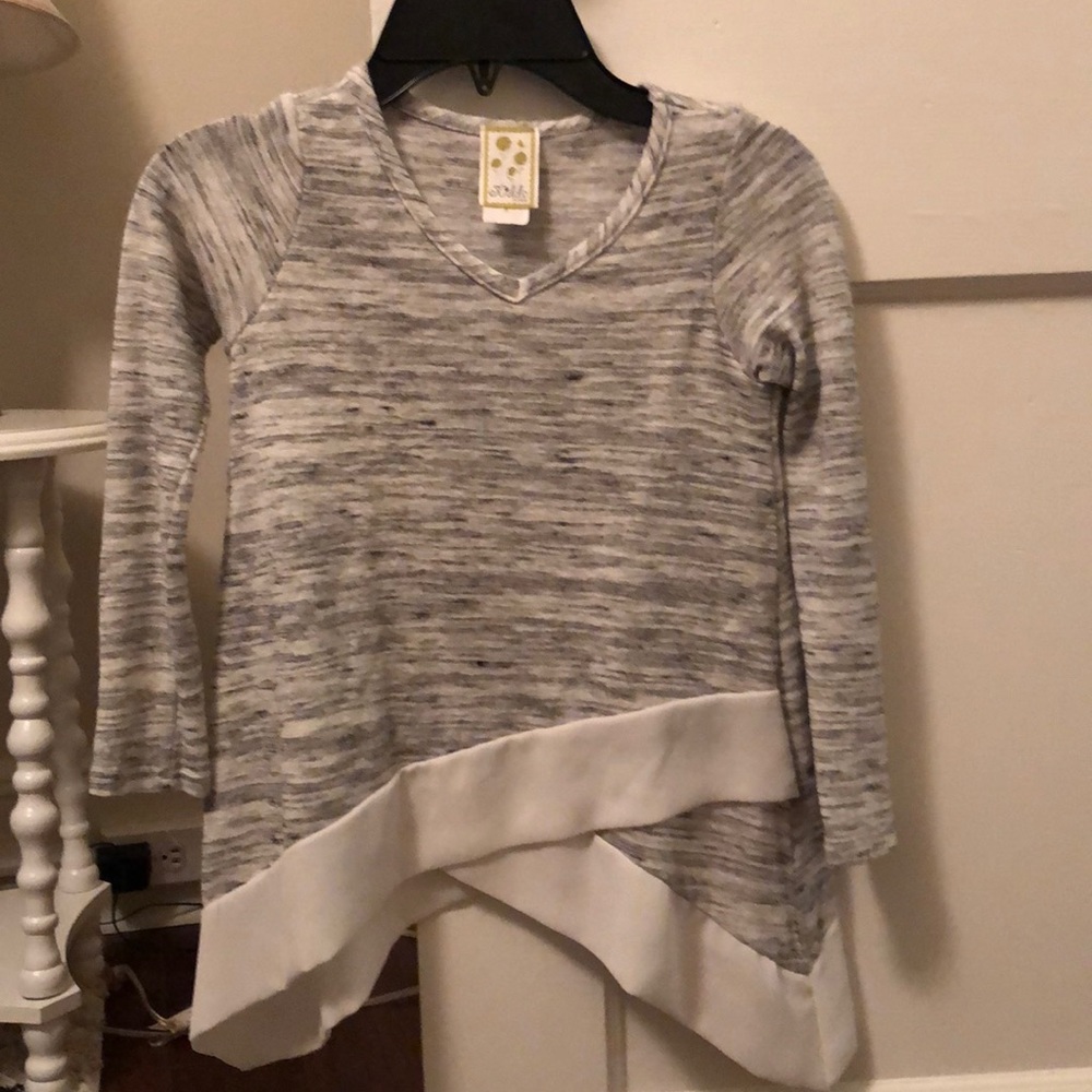 Girls blouse with asymmetrical  bottom